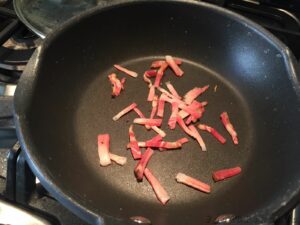 Preparazione Risotto speck mele e taleggio